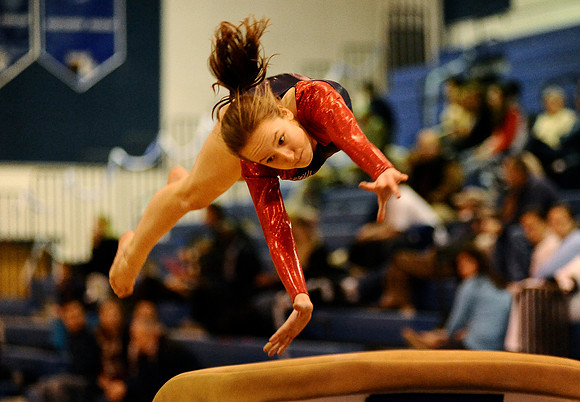 Jefferson sophomore Caroline Kerr jumps onto the vault during a gymnastics meet at West Potomac High School on January 3, 2011.