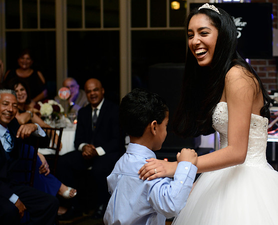 A young guest unexpected cuts in for a dance for Alex.