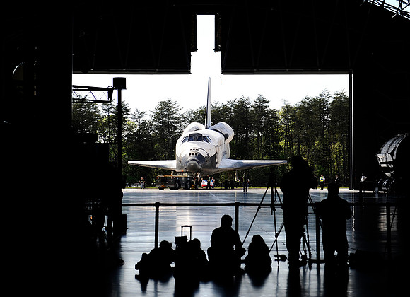 Space shuttle Discovery is moved into its new home at the Steven F. Udvar-Hazy Center on April 19, 2012. Discovery takes the place of the museum's previous shuttle, Enterprise.