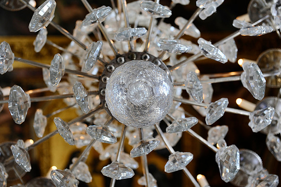 Detail of a chandelier in the Hall of Mirrors in the Palace of Versailles outside Paris, France.July 17, 2012