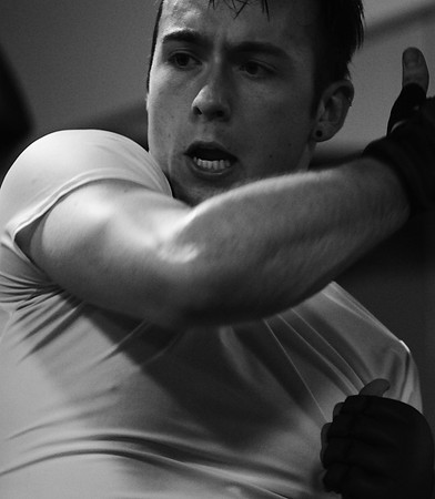 Jared Hockaday finishes a punch during the Martial Arts Boot Camp at Hockman's Martial Arts studio on February 9, 2009.